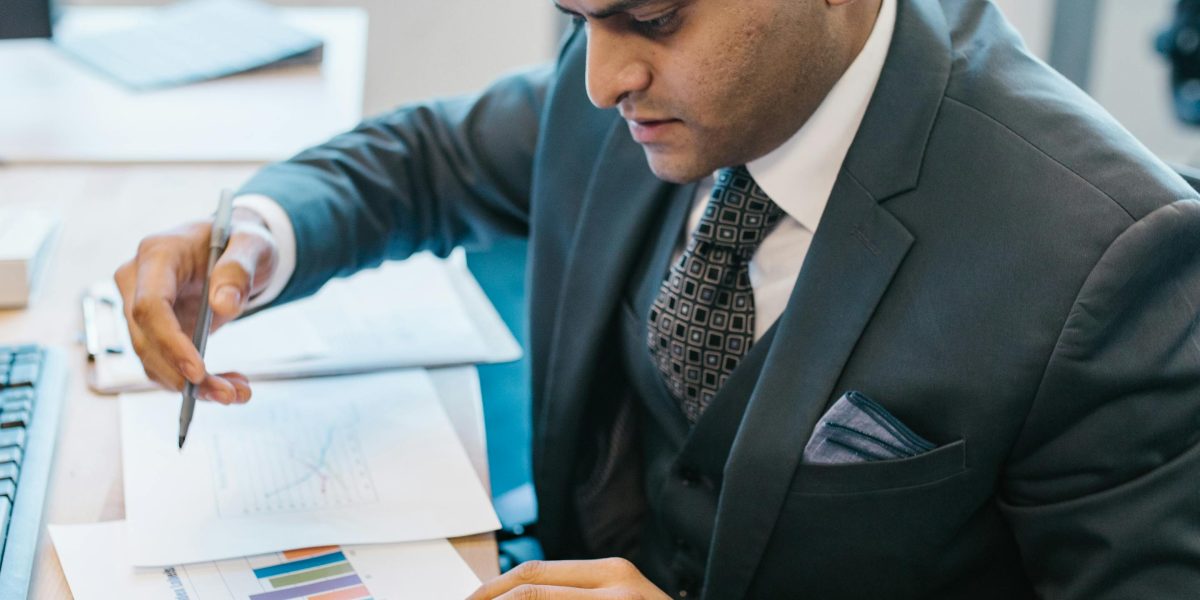 A business person making a swift, decisive move, symbolizing the instantaneous actions of quant trading algorithms.