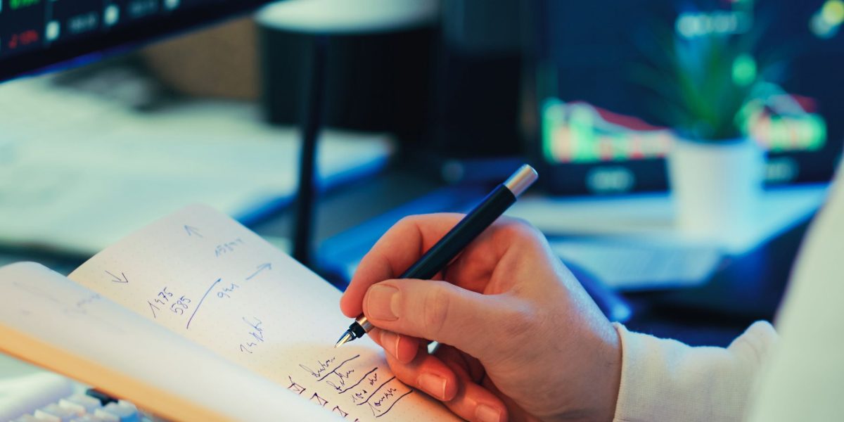 An individual making a thoughtful and strategic decision based on market information.