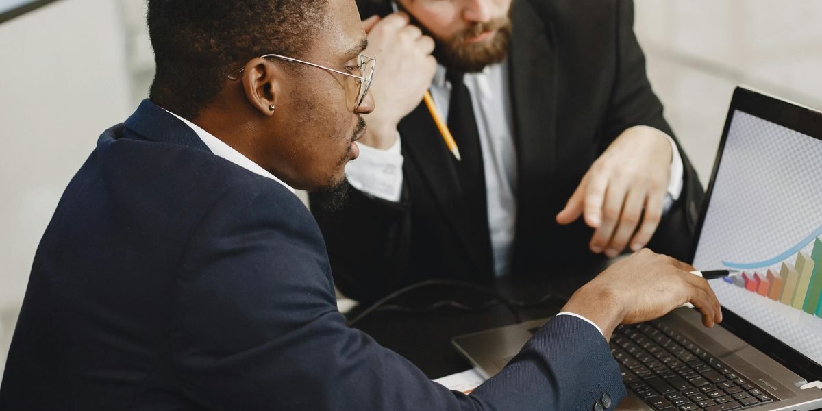 A team discussing global economic trends and their potential impact on investment strategies.