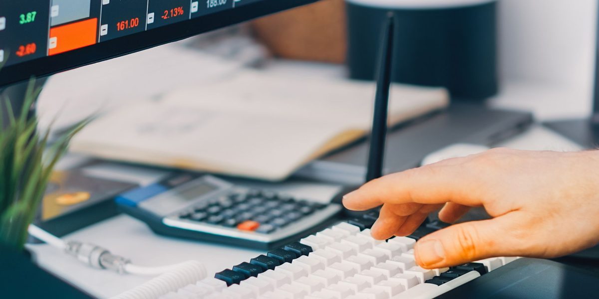 An individual effectively utilizing various digital tools and platforms to streamline their tech stock tracking and analysis process.