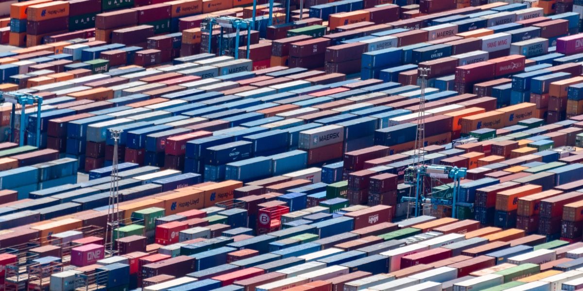A team of professionals collaborating to plan and secure critical global supply chains amidst geopolitical risks.