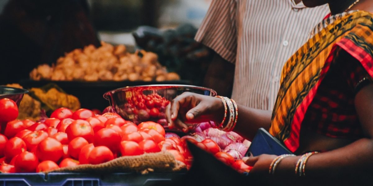 A professional analyzing diverse market sectors to identify new growth opportunities amidst economic shifts.