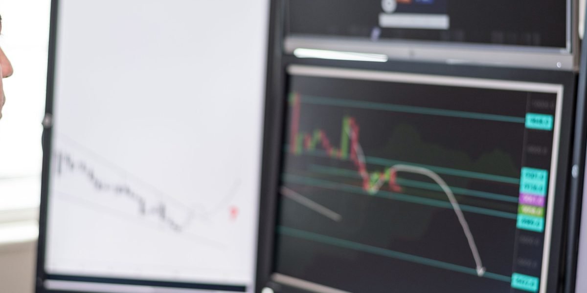 An investor meticulously analyzes market data, seeking to normalize figures and extract actionable insights for better investment strategies.