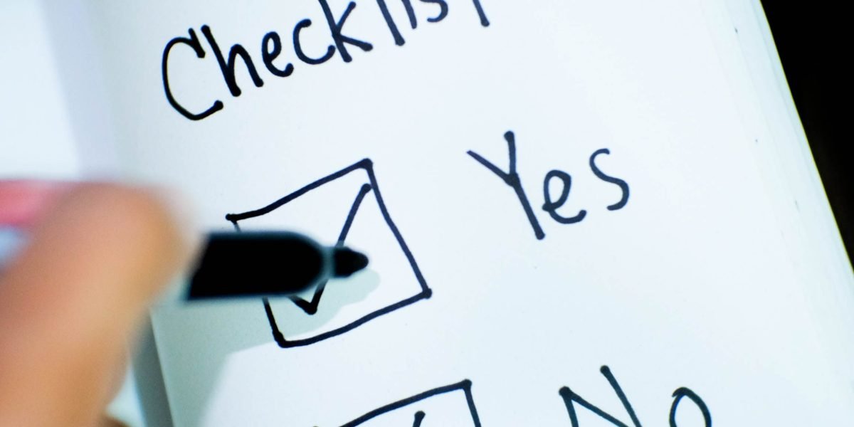 A professional carefully assessing options and making informed financial decisions in a focused environment.