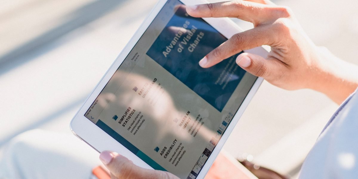 A person engaging with financial news content, reflecting the reader's interest in understanding market developments.